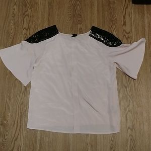 Pale pink with black lace shoulders size large